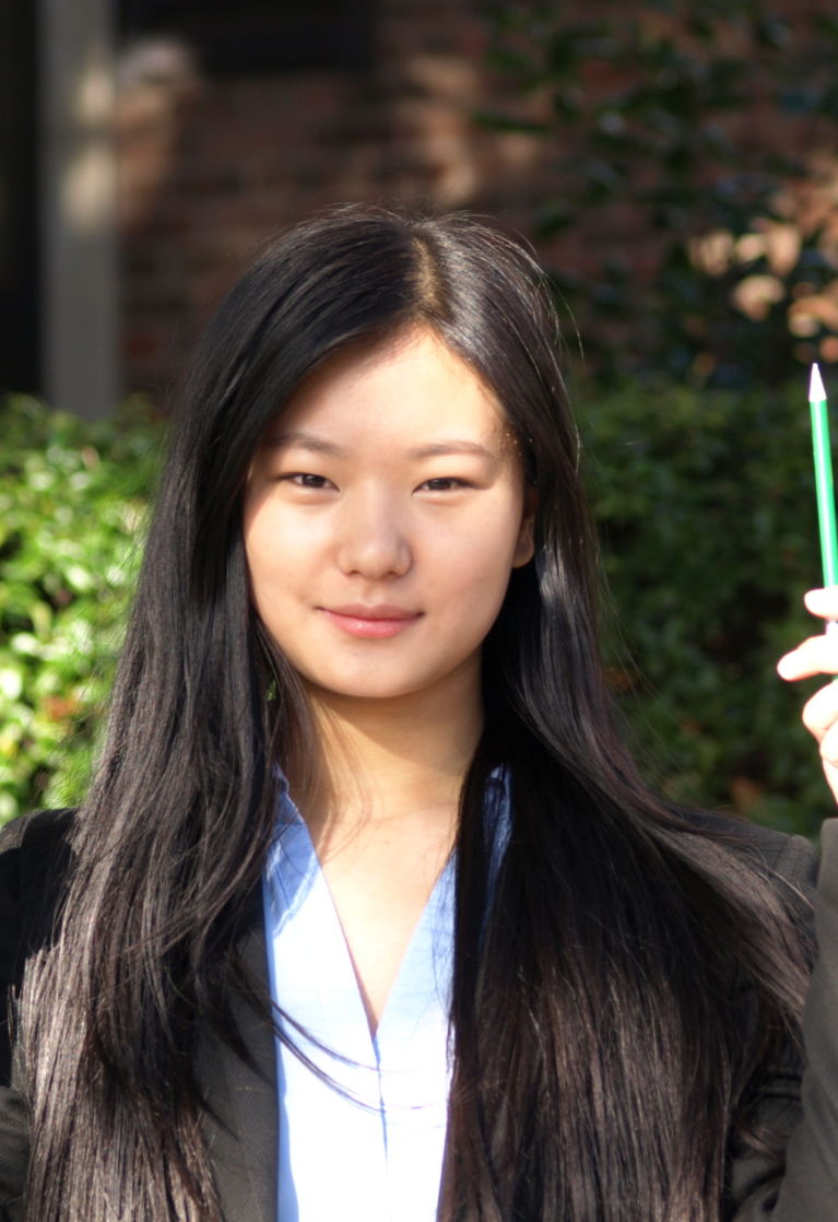 wycliffe pupil sophia holding colored pencils