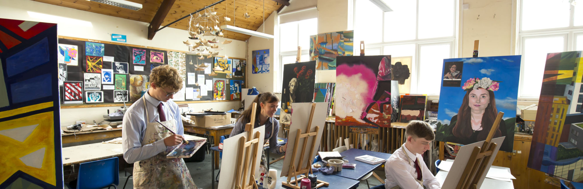 wycliffe senior pupils painting in art class