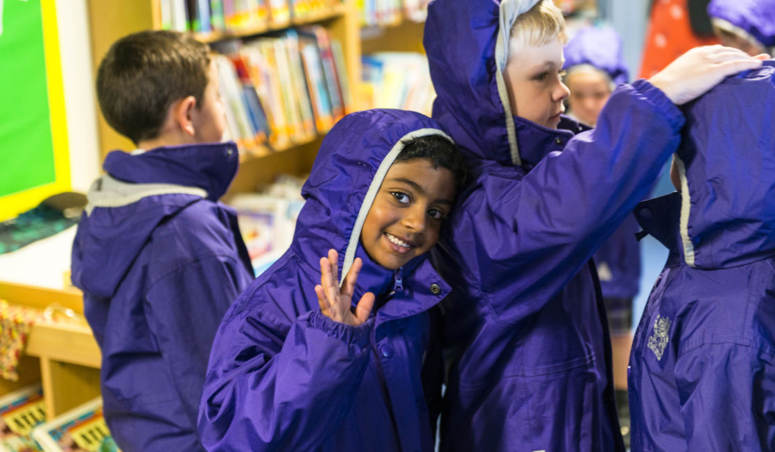 wycliffe kids wearing trenchcoats
