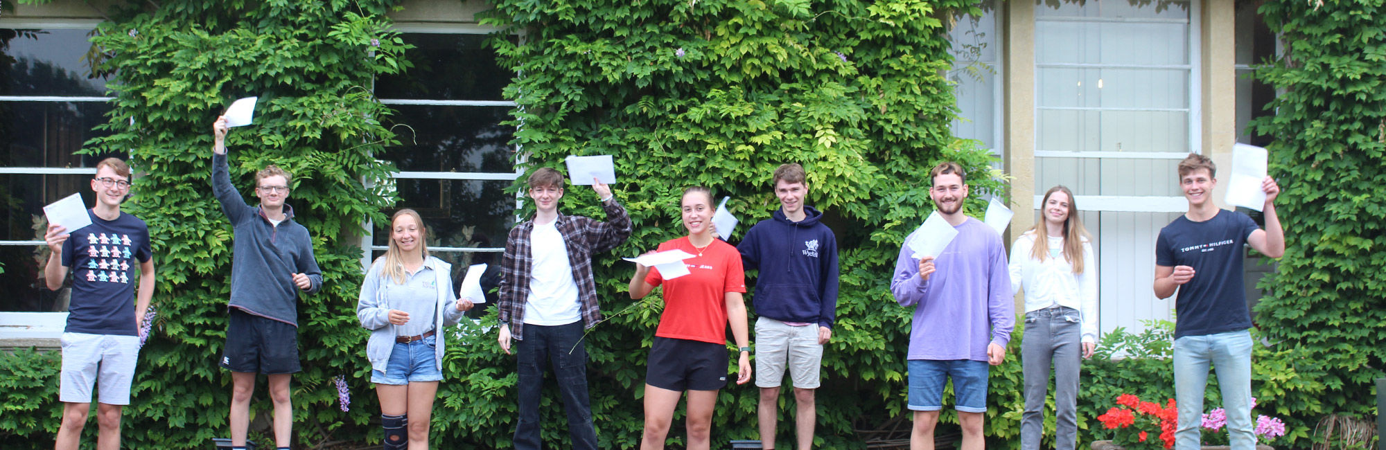 wycliffe students holding their GCSE results
