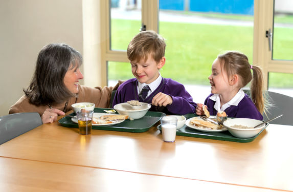 wycliffe teacher and students having breakfast