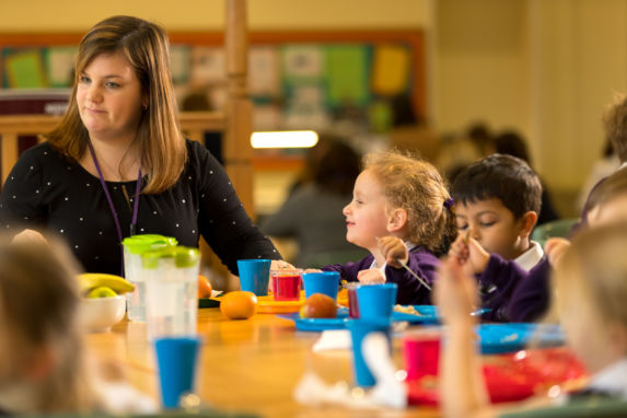 wycliffe kids and teacher having lunch at the table