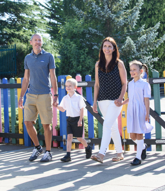 wycliffe pupils walking with their parents in the playground