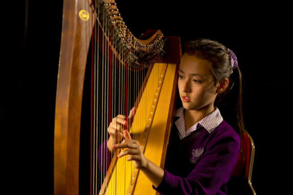 wycliffe pupil playing the harp