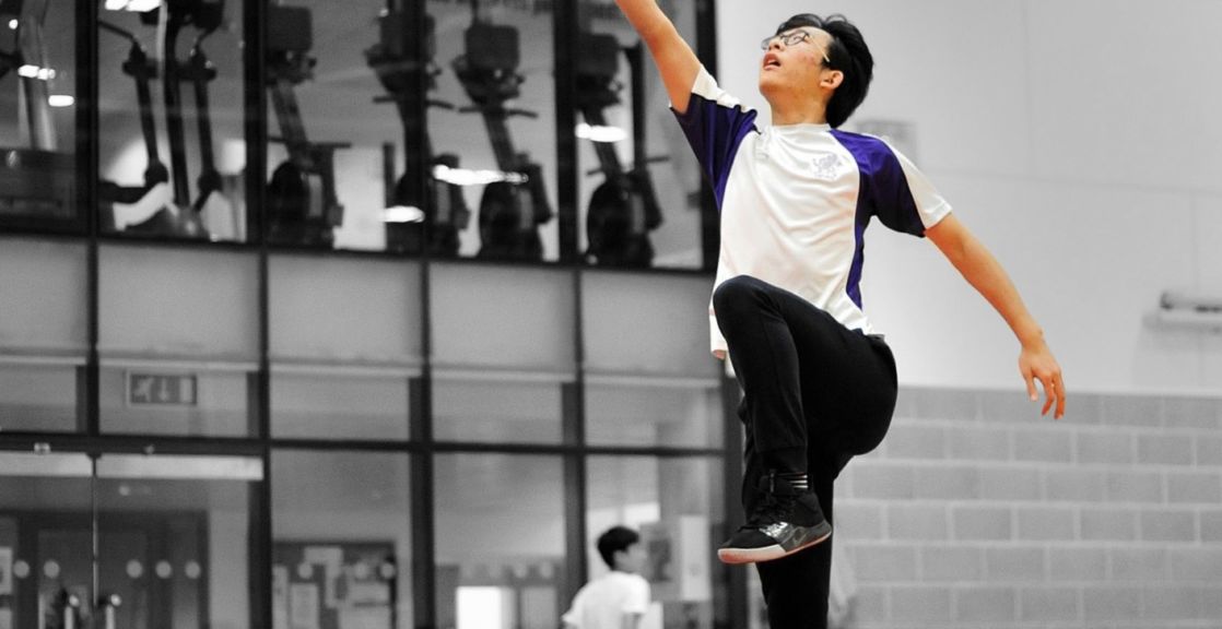 highlighted image of wycliffe pupil playing basketball