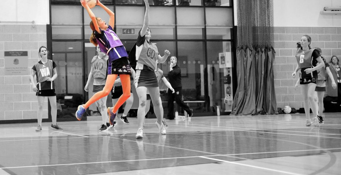 highlighted image of wycliffe girl playing netball