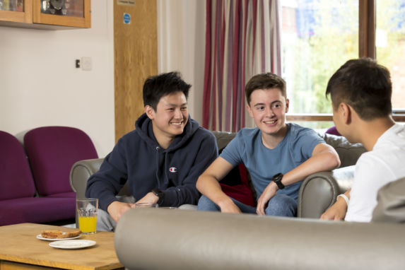 wycliffe boarding students sitting in the lounge room