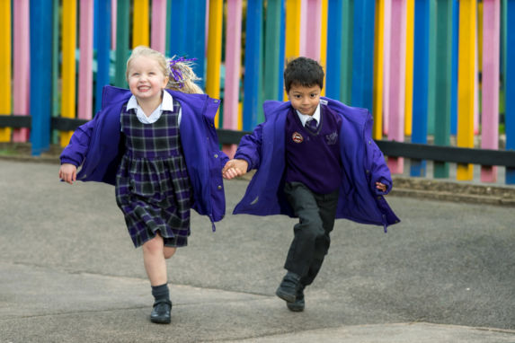 Nursery Children Playing in the playground