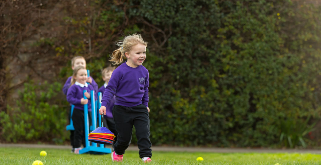 wycliffe nursery girl running outdoors
