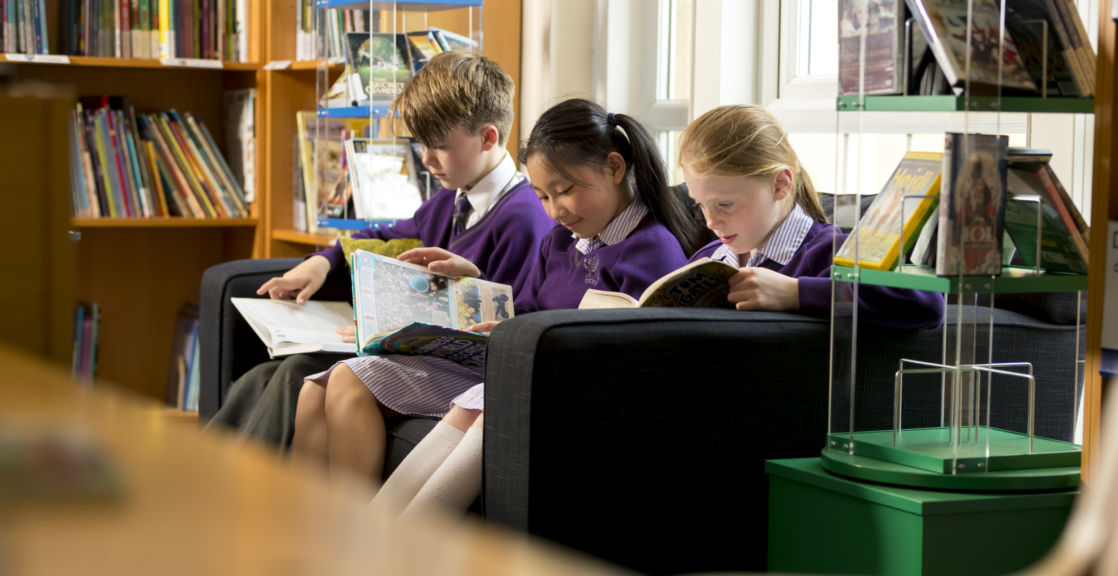 wycliffe kids reading in the library