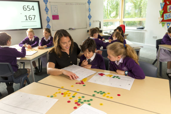 teacher giving one on one learning at Wycliffe prep school