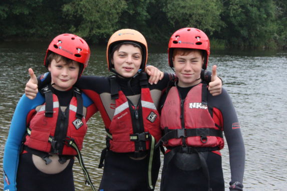 children at wycliffe independent school enjoying outdoor water sports