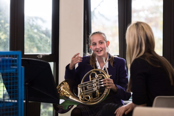 Wycliffe girl with musical instrument