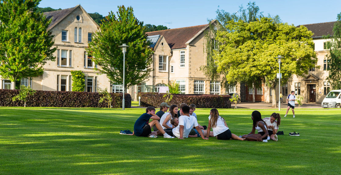 Wycliffe students sitting outdoors