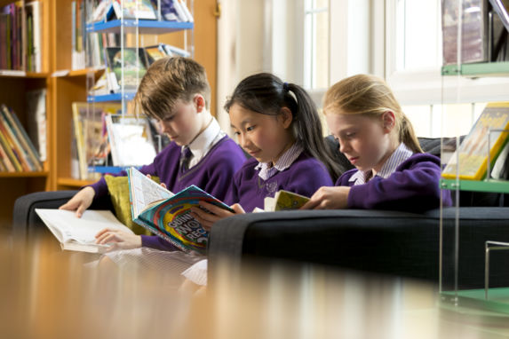 wycliffe kids reading in the library